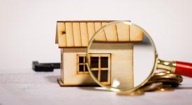House behind a magnifying glass