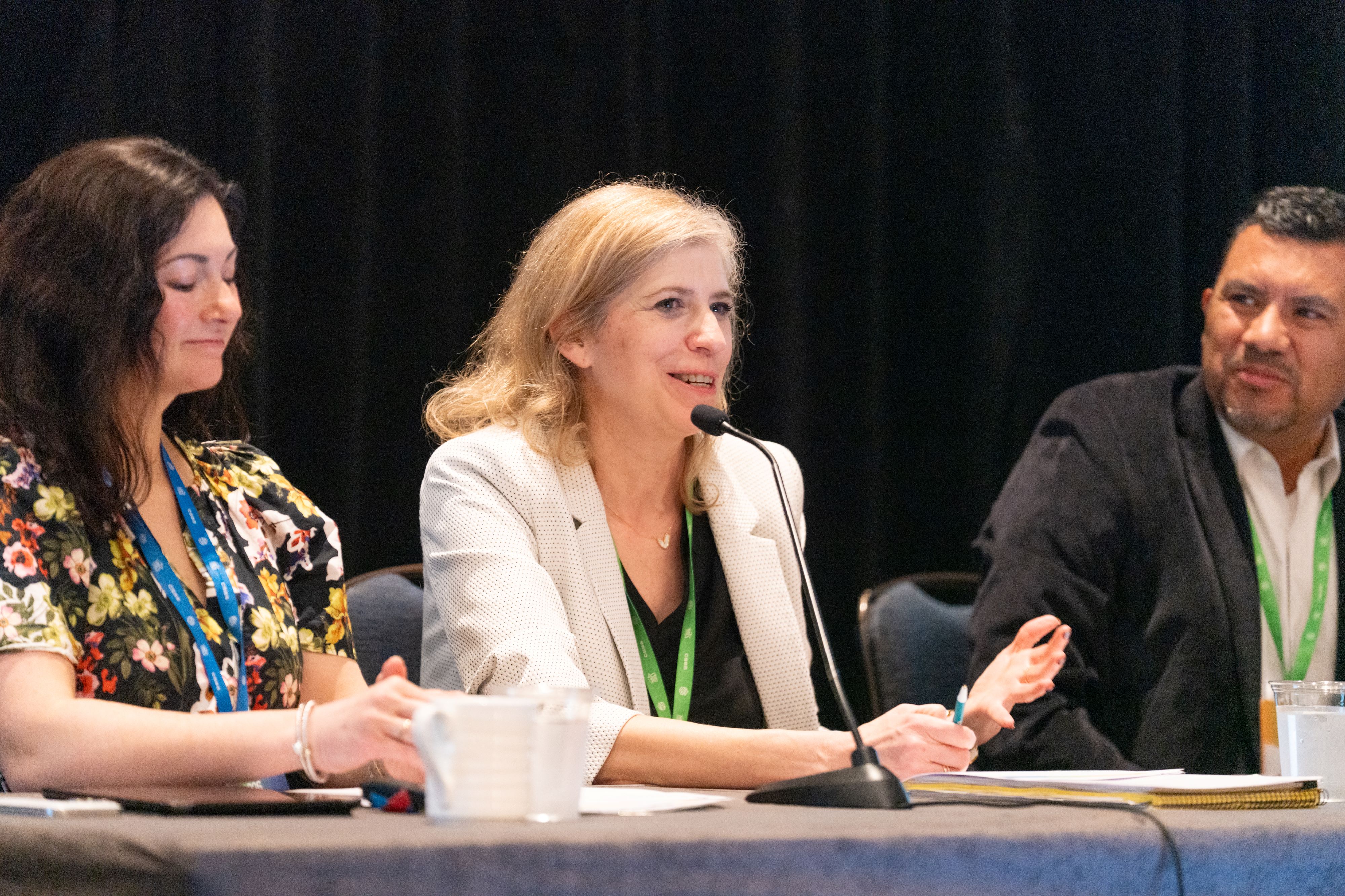 Woman speaking on a panel