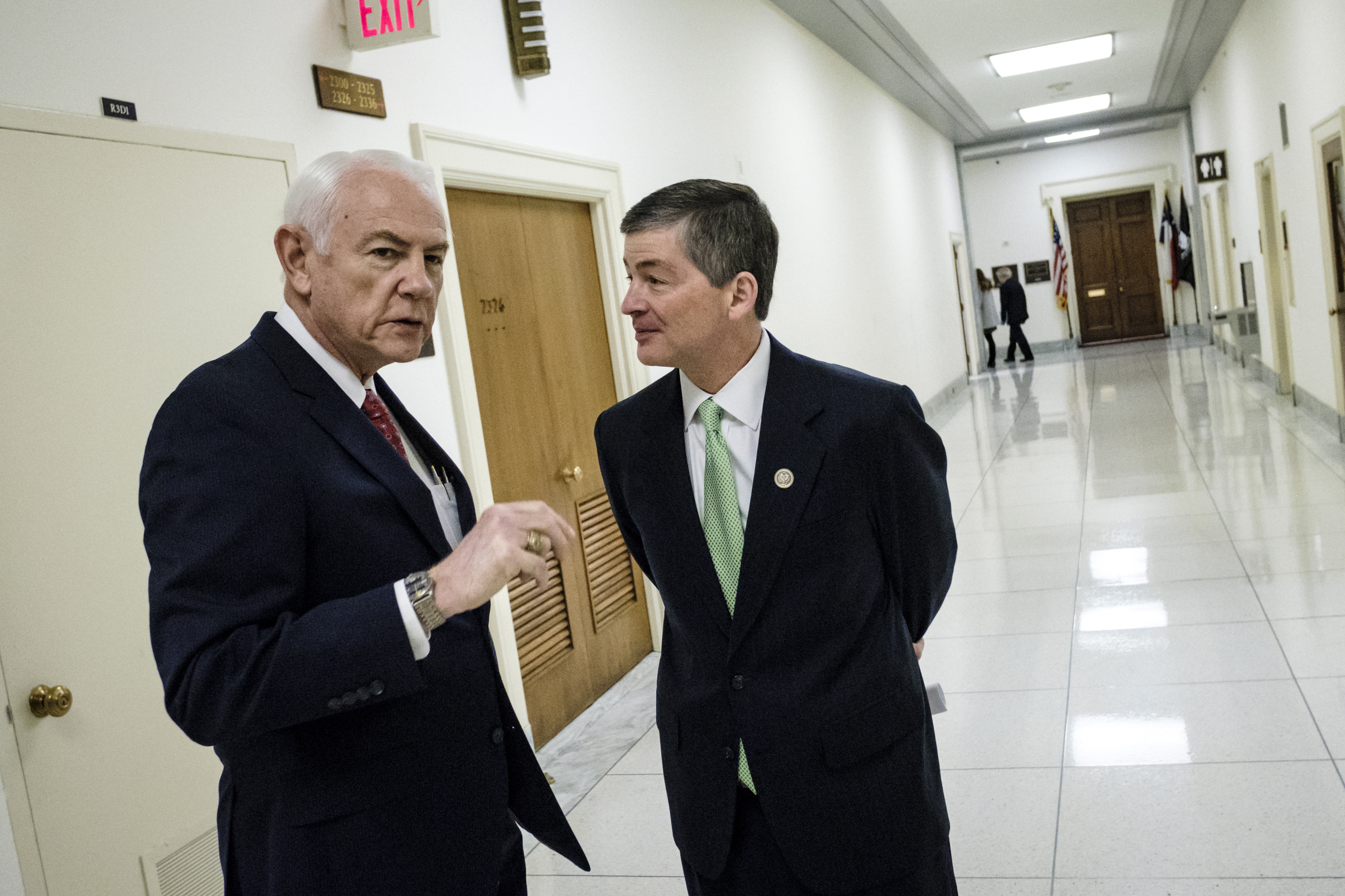 Charles Cooper (TX) speaks with Rep. Jeb Hensarling, chairman of the House Financial Services Committee,