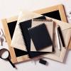 books and magnifying glass