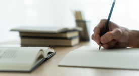 pen writing on paper